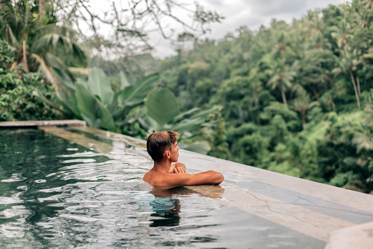 Human Swimming in Bali Infinity Pool